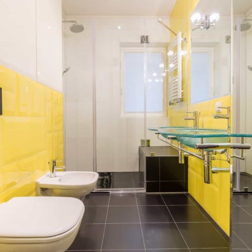 Bathroom with yellow tiles